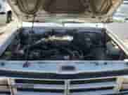 1990 Dodge Dakota with VIN 1B7GL23XXLS708226, listed as a Copart auction lot 69859125 with 372,216 mi miles and Salvage title. Bid and sale history available at DreamBid. Image 11.