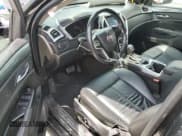 ✅ 2016 Cadillac SRX • VIN: 3GYFNAE33GS577218 • Lot: 67009165. Wystawiony na Copart z przebiegiem 102 903 mil. Bezpłatny archiwum sprzedaży aukcyjnych z USA i szczegółowy raport historii pojazdu na DreamBid. Zdjęcie 8.