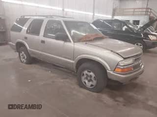 2003 Chevrolet Blazer LS z VIN 1GNDT13X43K132959, wystawiony jako IAAI lot #42629519 z przebiegiem 87 027 mil mil oraz . Historia ofert i sprzedaży dostępna na DreamBid. Obrazek 1.