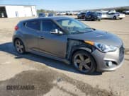 ✅ 2014 Hyundai Veloster Turbo • VIN: KMHTC6AE2EU210063 • Lot: 79243924. Wystawiony na Copart z przebiegiem 130 551 mil. Bezpłatny archiwum sprzedaży aukcyjnych z USA i szczegółowy raport historii pojazdu na DreamBid. Zdjęcie 4.