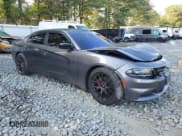 ✅ 2017 Dodge Charger SE • VIN: 2C3CDXBG6HH537424 • Lot: 71303395. Listed on Copart with 71,918 mi. Free auction sales archive from the USA and detailed vehicle history report at DreamBid. Image 4.