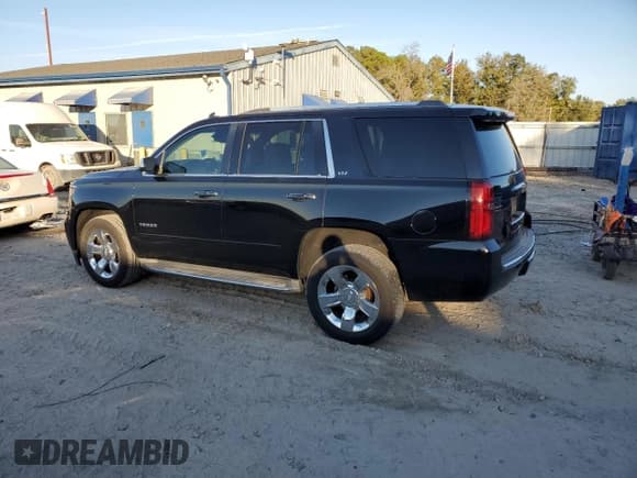 ✅ 2015 Chevrolet Tahoe LTZ • VIN: 1GNSCCKC4FR641821 • Lot: 91405345. Listed on Copart with 156,773 mi. Free auction sales archive from the USA and detailed vehicle history report at DreamBid. Image 2.