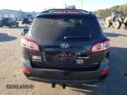 ✅ 2012 Hyundai Santa Fe Limited • VIN: 5XYZKDAG9CG096018 • Lot: 77713144. Listed on Copart with 139,964 mi. Free auction sales archive from the USA and detailed vehicle history report at DreamBid. Image 6.