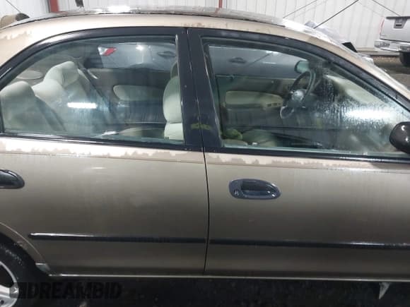 ✅ 1998 Mazda Protege DX • VIN: JM1BC141XW0200689 • Lot: 41540162. Listed on IAAI with 172,311 mi. Free auction sales archive from the USA and detailed vehicle history report at DreamBid. Image 13.