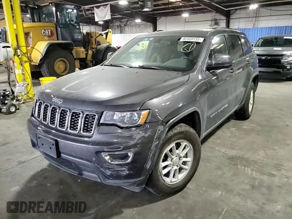 ✅ 2019 Jeep Grand Cherokee Laredo E • VIN: 1C4RJFAG1KC835237 • Lot: 92459155. Listed on Copart with 91,170 mi. Free auction sales archive from the USA and detailed vehicle history report at DreamBid. Image 14.
