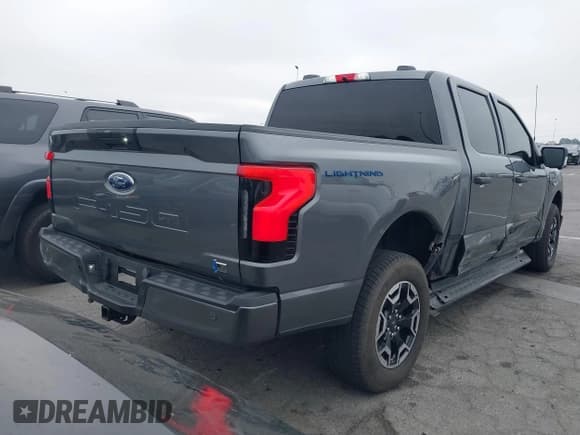 ✅ 2023 Ford F-150 Lightning Pro • VIN: 1FTVW1EL8PWG48559 • Лот: 42033123. Опубликован ранее на IAAI с пробегом 8 845 миль. Бесплатный доступ к архиву аукционных продаж из США и подробный отчёт об истории автомобиля на DreamBid. Изображение 4.