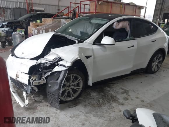 ✅ 2023 Tesla Model Y Long Range • VIN: 7SAYGAEEXPF789037 • Lot: 41551605. Listed on IAAI with 8,630 mi. Free auction sales archive from the USA and detailed vehicle history report at DreamBid. Image 2.