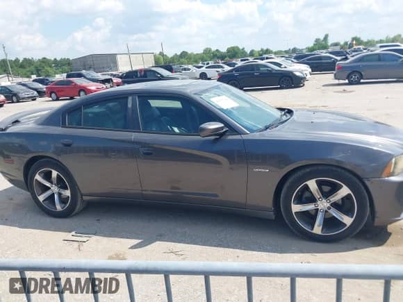 2014 Dodge Charger SXT Plus z VIN 2C3CDXHG2EH256675, wystawiony jako IAAI lot #43153204 z przebiegiem 139 843 mil mil oraz . Historia ofert i sprzedaży dostępna na DreamBid. Obrazek 13.