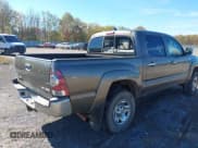 ✅ 2014 Toyota Tacoma • VIN: 5TFLU4ENXEX107441 • Lot: 43569911. Listed on IAAI with 183,301 mi. Free auction sales archive from the USA and detailed vehicle history report at DreamBid. Image 4.