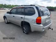 ✅ 2006 GMC Envoy SLE • VIN: 1GKDT13S762116213 • Lot: 42770038. Listed on IAAI with 231,915 mi. Free auction sales archive from the USA and detailed vehicle history report at DreamBid. Image 3.