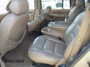 ✅ 1999 Lincoln Navigator • VIN: 5LMRU27L4XLJ04029 • Лот: 42037116. Опубликован ранее на IAAI с пробегом Не указан. Бесплатный доступ к архиву аукционных продаж из США и подробный отчёт об истории автомобиля на DreamBid. Изображение 8.