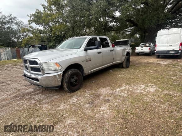 ✅ 2014 Ram 3500 Tradesman • VIN: 3C63RPGLXEG108065 • Лот: 43269975. Опубликован ранее на Copart с пробегом 268 985 миль. Бесплатный доступ к архиву аукционных продаж из США и подробный отчёт об истории автомобиля на DreamBid. Изображение 2.