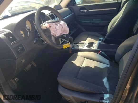 2009 Dodge Charger SXT с VIN 2B3KA33V09H566345, выставлен на аукционе Copart как лот 77218464 с пробегом 284 499 миль миль и Списание • Salvage title. История ставок и продаж доступна на DreamBid. Изображение 7.