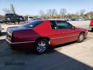 ✅ 2002 Cadillac Eldorado ESC • VIN: 1G6EL12Y02B101569 • Лот: 46216994. Опубликован ранее на Copart с пробегом 94 758 миль. Бесплатный доступ к архиву аукционных продаж из США и подробный отчёт об истории автомобиля на DreamBid. Изображение 3.