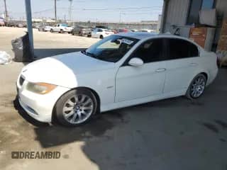 2006 BMW 3 Series 330i with VIN WBAVB33516PS14128, listed as a Copart auction lot 82247535 with 244,971 mi miles and Salvage title. Bid and sale history available at DreamBid. Image 1.