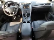 ✅ 2013 Ford Fusion Titanium Hybrid • VIN: 3FA6P0RU5DR367807 • Lot: 62542965. Listed on Copart with 177,134 mi. Free auction sales archive from the USA and detailed vehicle history report at DreamBid. Image 8.