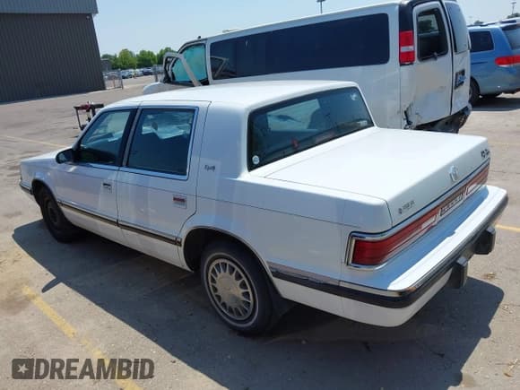 ✅ 1992 Dodge Dynasty LE • VIN: 1B3XC56RXND723509 • Lot: 42769093. Listed on IAAI with 99,589 mi. Free auction sales archive from the USA and detailed vehicle history report at DreamBid. Image 3.
