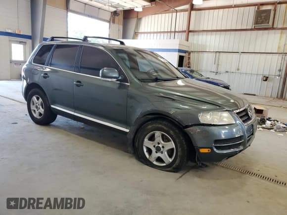 ✅ 2004 Volkswagen Touareg • VIN: WVGBC77L94D069868 • Лот: 65748945. Опубликован ранее на Copart с пробегом 201 709 миль. Бесплатный доступ к архиву аукционных продаж из США и подробный отчёт об истории автомобиля на DreamBid. Изображение 4.