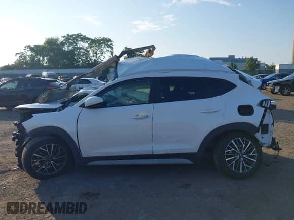 2020 Hyundai Tucson SEL with VIN KM8J3CAL9LU144547, listed as a IAAI auction lot 42869898 with Not provided miles and . Bid and sale history available at DreamBid. Image 14.