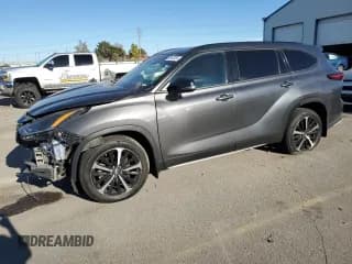 ✅ 2021 Toyota Highlander XSE • VIN: 5TDLZRBH1MS138806 • Lot: 79476124. Listed on Copart with 93,056 mi. Free auction sales archive from the USA and detailed vehicle history report at DreamBid. Image 1.