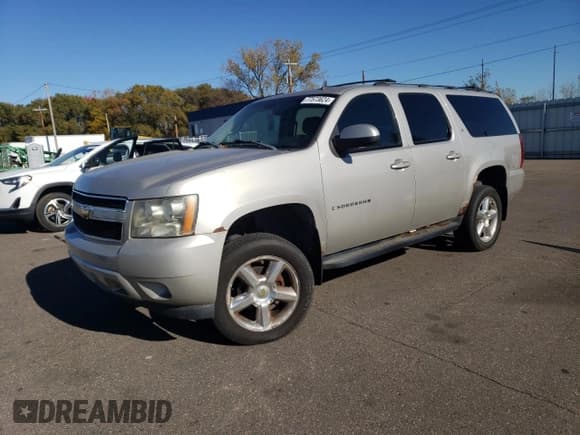 ✅ 2007 Chevrolet Suburban LTZ • VIN: 3GNFK16387G102896 • Lot: 77573624. Wystawiony na Copart z przebiegiem 248 018 mil. Bezpłatny archiwum sprzedaży aukcyjnych z USA i szczegółowy raport historii pojazdu na DreamBid. Zdjęcie 1.