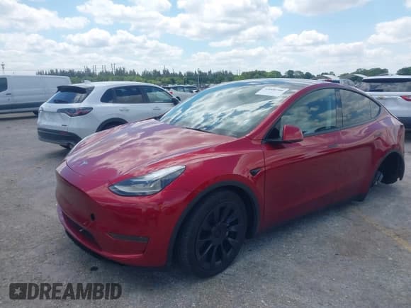 ✅ 2024 Tesla Model Y • VIN: 7SAYGDED7RF045410 • Лот: 42000700. Опубликован ранее на IAAI с пробегом 13 021 миль. Бесплатный доступ к архиву аукционных продаж из США и подробный отчёт об истории автомобиля на DreamBid. Изображение 18.
