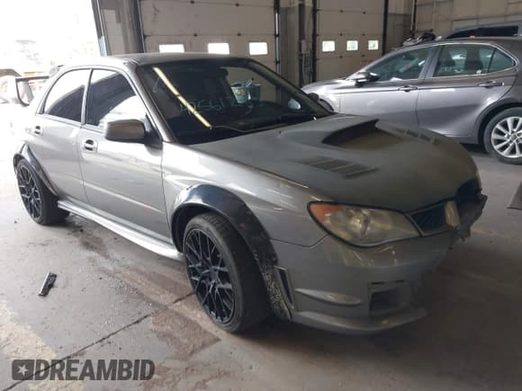 ✅ 2006 Subaru Impreza WRX STI • VIN: JF1GD70626L519824 • Lot: 42561283. Listed on IAAI with 148,589 mi. Free auction sales archive from the USA and detailed vehicle history report at DreamBid. Image 1.