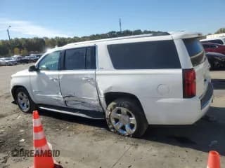 ✅ 2016 Chevrolet Suburban LTZ • VIN: 1GNSKJKC1GR209874 • Lot: 77108344. Wystawiony na Copart z przebiegiem 221 079 mil. Bezpłatny archiwum sprzedaży aukcyjnych z USA i szczegółowy raport historii pojazdu na DreamBid. Zdjęcie 2.