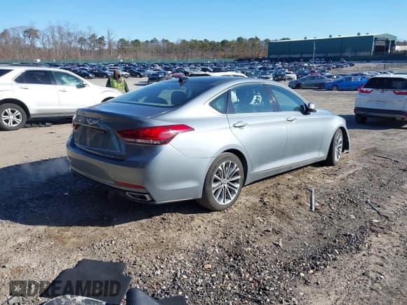 ✅ 2016 Hyundai Genesis 3.8L • VIN: KMHGN4JE3GU137577 • Lot: 41599851. Wystawiony na IAAI z przebiegiem 158 011 mil. Bezpłatny archiwum sprzedaży aukcyjnych z USA i szczegółowy raport historii pojazdu na DreamBid. Zdjęcie 4.
