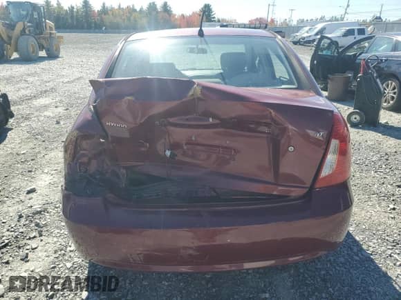 2006 Hyundai Accent GL z VIN KMHCN45C26U052459, wystawiony jako Copart lot #84417075 z przebiegiem 247 312 mil mil oraz Szkoda całkowita • Salvage title. Historia ofert i sprzedaży dostępna na DreamBid. Obrazek 6.