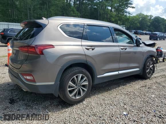 2019 Hyundai Santa Fe Ultimate z VIN 5NMS53AD3KH004785, wystawiony jako Copart lot #62736825 z przebiegiem 73 413 mil mil oraz Szkoda całkowita • Salvage title. Historia ofert i sprzedaży dostępna na DreamBid. Obrazek 3.