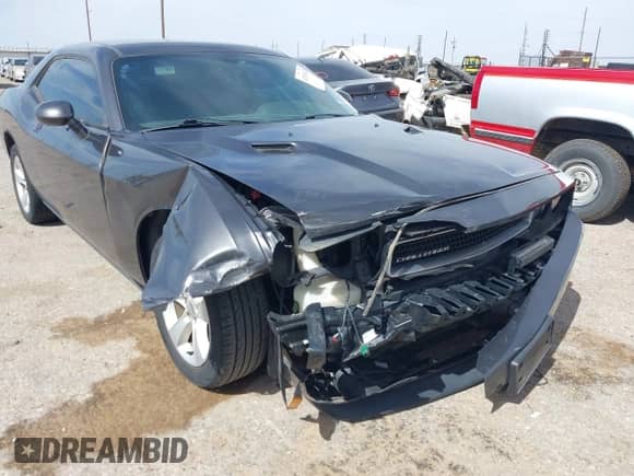 2014 Dodge Challenger SXT 100th Anniversary z VIN 2C3CDYAGXEH298415, wystawiony jako IAAI lot #42133602 z przebiegiem 126 523 mil mil oraz . Historia ofert i sprzedaży dostępna na DreamBid. Obrazek 6.