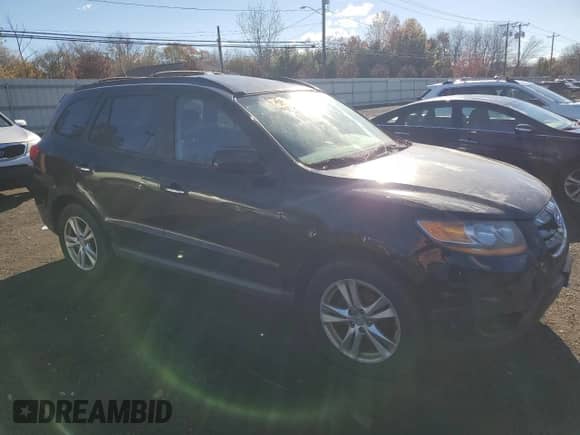 2011 Hyundai Santa Fe Limited with VIN 5XYZKDAGXBG062460, listed as a Copart auction lot 90709335 with 188,168 mi miles and Clean title. Bid and sale history available at DreamBid. Image 4.