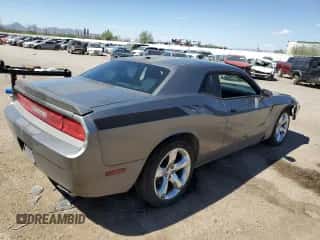 2012 Dodge Challenger SXT z VIN 2C3CDYAG4CH153576, wystawiony jako Copart lot #71494414 z przebiegiem 139 650 mil mil oraz Szkoda całkowita • Salvage title. Historia ofert i sprzedaży dostępna na DreamBid. Obrazek 3.