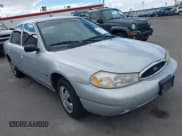 ✅ 2000 Ford Contour SE Fleet • VIN: 1FAFP66LXYK134000 • Lot: 42148527. Listed on IAAI with 163,119 mi. Free auction sales archive from the USA and detailed vehicle history report at DreamBid. Image 1.