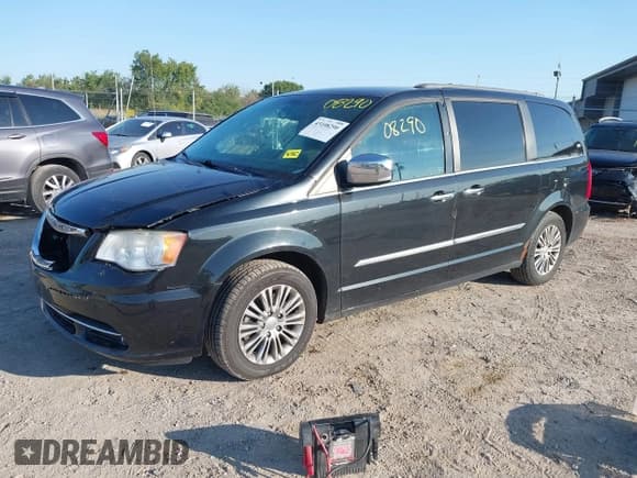 ✅ 2013 Chrysler Town & Country Touring L • VIN: 2C4RC1CG6DR711856 • Lot: 43108290. Listed on IAAI with 217,721 mi. Free auction sales archive from the USA and detailed vehicle history report at DreamBid. Image 2.