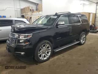 2020 Chevrolet Tahoe Premier z VIN 1GNSKCKJ5LR122385, wystawiony jako Copart lot #43310075 z przebiegiem Nie podano mil oraz Szkoda całkowita • Salvage title. Historia ofert i sprzedaży dostępna na DreamBid. Obrazek 1.