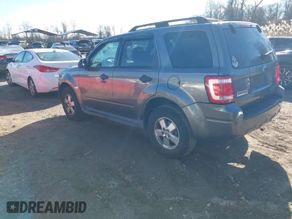 ✅ 2009 Ford Escape XLT • VIN: 1FMCU03799KC86292 • Lot: 43915919. Listed on IAAI with 163,766 mi. Free auction sales archive from the USA and detailed vehicle history report at DreamBid. Image 3.