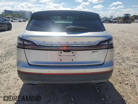 ✅ 2019 Lincoln Nautilus Reserve • VIN: 2LMPJ6LP1KBL50990 • Lot: 69210645. Listed on Copart with 65,309 mi. Free auction sales archive from the USA and detailed vehicle history report at DreamBid. Image 6.