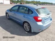 ✅ 2012 Subaru Impreza Premium • VIN: JF1GPAE67CH230918 • Lot: 43383808. Listed on IAAI with 124,512 mi. Free auction sales archive from the USA and detailed vehicle history report at DreamBid. Image 3.