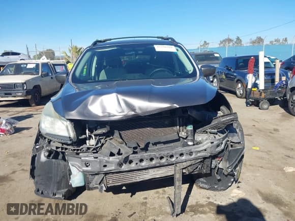 ✅ 2013 Ford Escape SE • VIN: 1FMCU9G97DUD10571 • Lot: 43798281. Listed on IAAI with 156,022 mi. Free auction sales archive from the USA and detailed vehicle history report at DreamBid. Image 12.