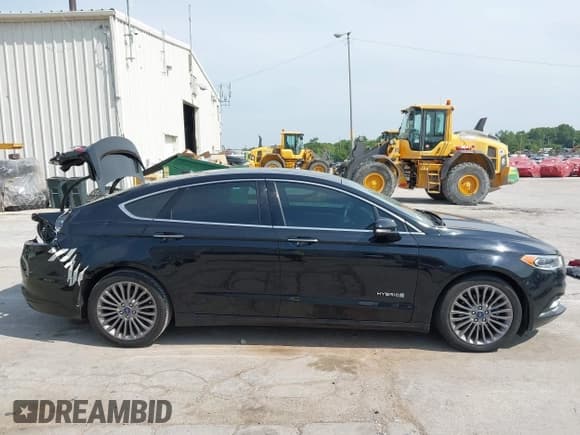 ✅ 2017 Ford Fusion Hybrid Titanium • VIN: 3FA6P0RU2HR360481 • Лот: 42902061. Опубликован ранее на IAAI с пробегом 88 086 миль. Бесплатный доступ к архиву аукционных продаж из США и подробный отчёт об истории автомобиля на DreamBid. Изображение 14.