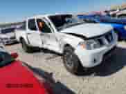 2014 Nissan Frontier Desert Runner z VIN 1N6AD0ER7EN754973, wystawiony jako Copart lot #80178315 z przebiegiem 60 548 mil mil oraz Szkoda całkowita • Salvage title. Historia ofert i sprzedaży dostępna na DreamBid. Obrazek 4.