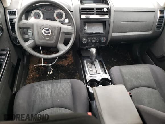 ✅ 2008 Mazda Tribute Sport • VIN: 4F2CZ02Z58KM26393 • Лот: 81321824. Опубликован ранее на Copart с пробегом 128 193 миль. Бесплатный доступ к архиву аукционных продаж из США и подробный отчёт об истории автомобиля на DreamBid. Изображение 8.