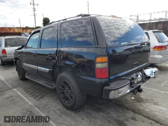 ✅ 2004 GMC Yukon SLE • VIN: 1GKEC13T04R186881 • Lot: 85373715. Listed on Copart with Not provided. Free auction sales archive from the USA and detailed vehicle history report at DreamBid. Image 2.
