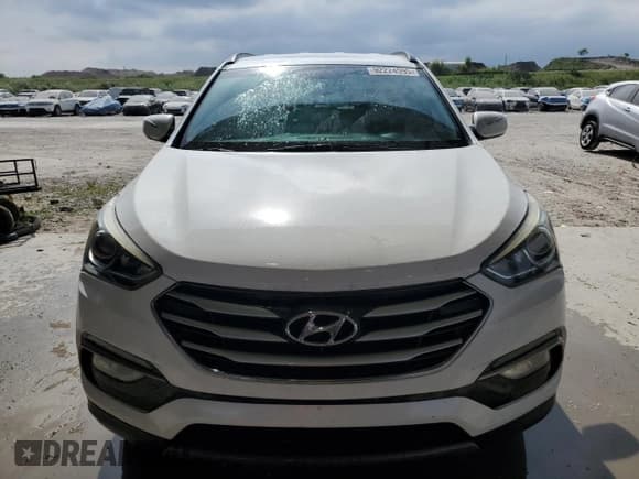 ✅ 2018 Hyundai Santa Fe 2.4L • VIN: 5XYZU3LBXJG534368 • Lot: 92224595. Wystawiony na Copart z przebiegiem 84 290 mil. Bezpłatny archiwum sprzedaży aukcyjnych z USA i szczegółowy raport historii pojazdu na DreamBid. Zdjęcie 5.