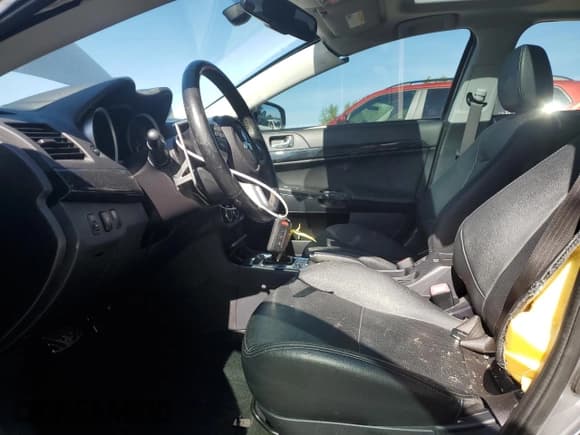 ✅ 2015 Mitsubishi Lancer Evolution MR • VIN: JA32W5FV2FU010441 • Lot: 58816275. Wystawiony na Copart z przebiegiem 72 531 mil. Bezpłatny archiwum sprzedaży aukcyjnych z USA i szczegółowy raport historii pojazdu na DreamBid. Zdjęcie 7.