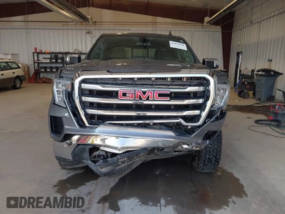 ✅ 2020 GMC Sierra 1500 SLE • VIN: 3GTU9BED4LG125100 • Лот: 42850248. Опубликован ранее на IAAI с пробегом 74 702 миль. Бесплатный доступ к архиву аукционных продаж из США и подробный отчёт об истории автомобиля на DreamBid. Изображение 6.
