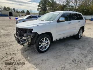 ✅ 2014 Jeep Grand Cherokee Summit • VIN: 1C4RJFJG3EC316078 • Lot: 91797525. Listed on Copart with 167,985 mi. Free auction sales archive from the USA and detailed vehicle history report at DreamBid. Image 1.