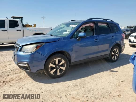 2017 Subaru Forester Limited with VIN JF2SJAJCXHH515686, listed as a Copart auction lot 67327815 with 104,049 mi miles and Salvage title. Bid and sale history available at DreamBid. Image 1.